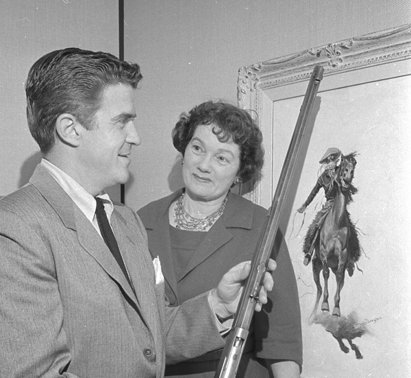 A. T. Simon III and Helen Card, with Frederic Remington painting, around 1960