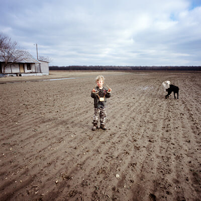 Little Steele in the Cornfield, Mississippi, photograph by Kathleen Robbins © 2006. See more at the Jennifer Schwartz Gallery.