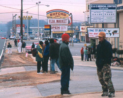 Day Laborers waiting for work on Buford Highway. Chamblee, Georgia. Photo by Mary Odem, 2001