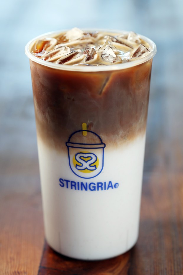 The Stringria Coffee and Tea Bar iced coconut latte is seen at Gangnam Food Hall, 1001 W. Chicago Avenue in Chicago, on April 30, 2024. (Terrence Antonio James/Chicago Tribune)