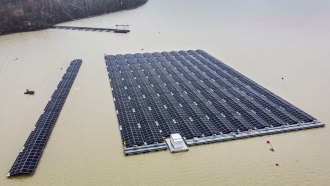 aerial photo of floating solar panels on a lake in Haltern, Germany