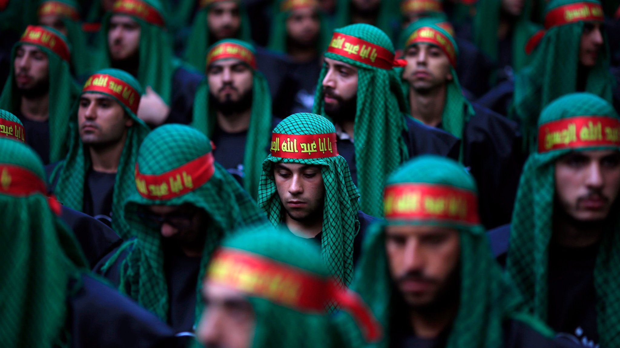 Lebanese Shia supporters of Hezbollah listen to the story of Imam Hussein in Beirut