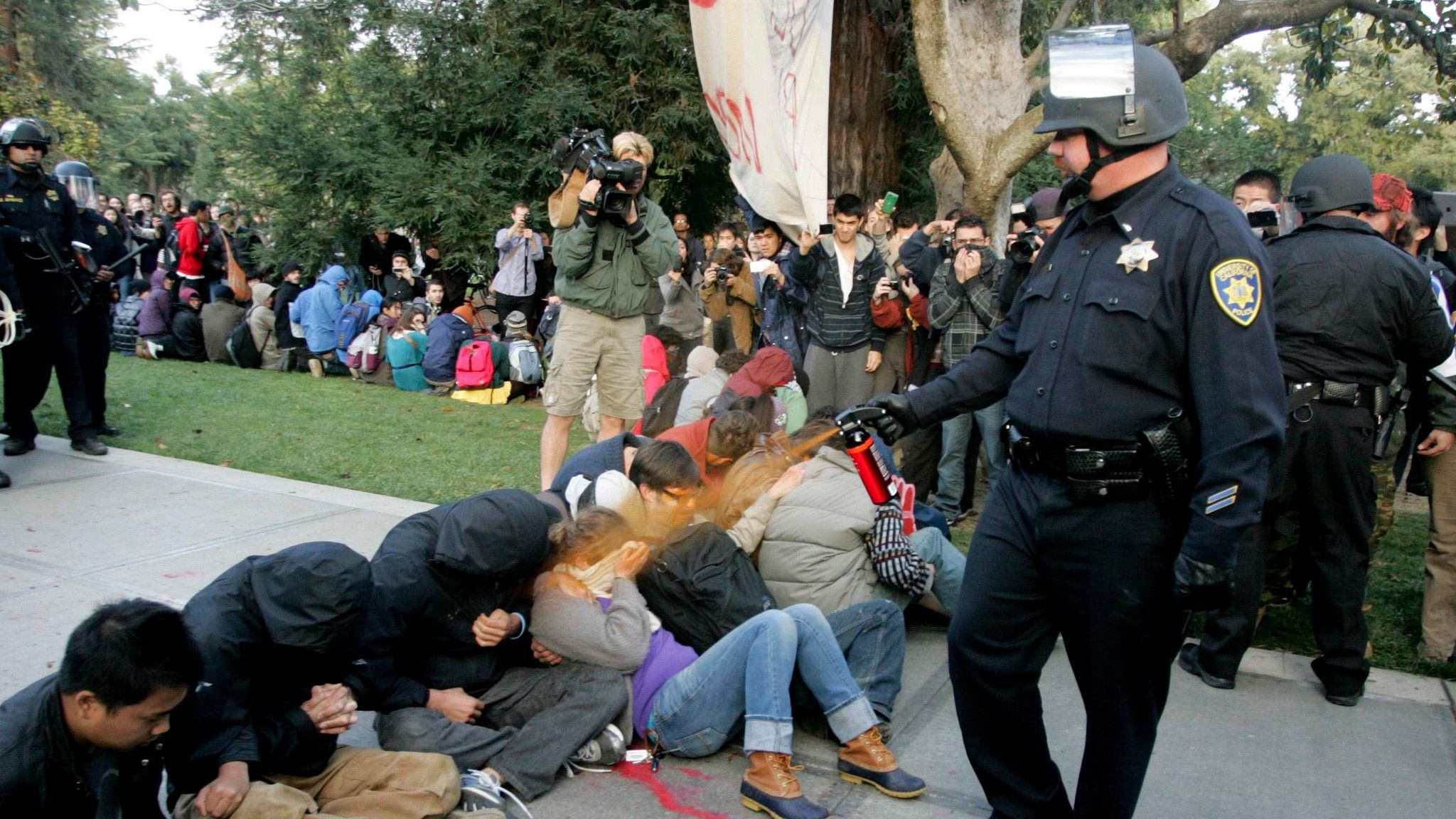 Students at UC Davis are sprayed with pepper spray
