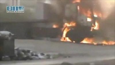 Amateur video footage of truck on fire in Hama