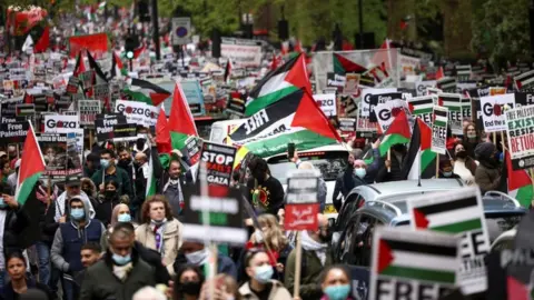 Reuters Protesters march in London in support of Palestinians amid ongoing violence with Israel