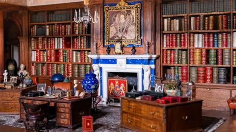 © His Majesty King Charles III 2024/PA The Library inside the Dolls' House.