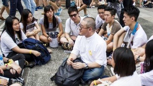 Students gather and sing freedom songs during a strike at the Chinese University of Hong Kong on 22 September 2014.