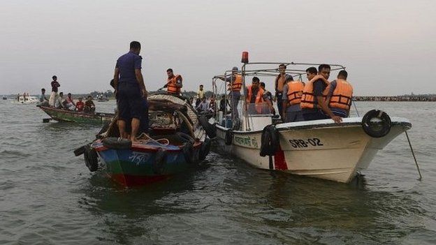 Rescuers look for bodies of victims after a ferry capsized in Bangladesh - 15 May 2014