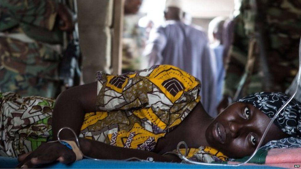 A young woman lies ill in a makeshift hospital room in Maiduguri on 25 March 2015