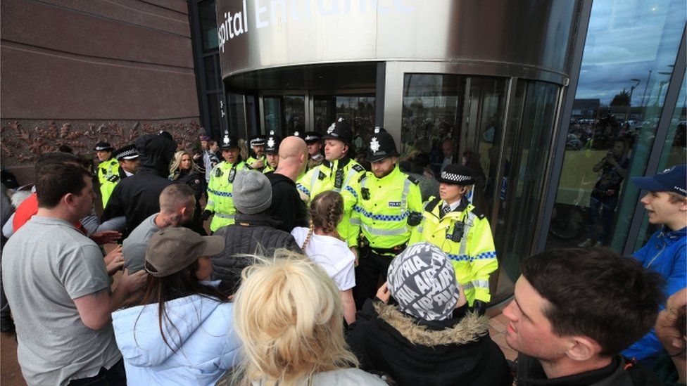 Protesters trying to storm the Alder Hey hospital entrance