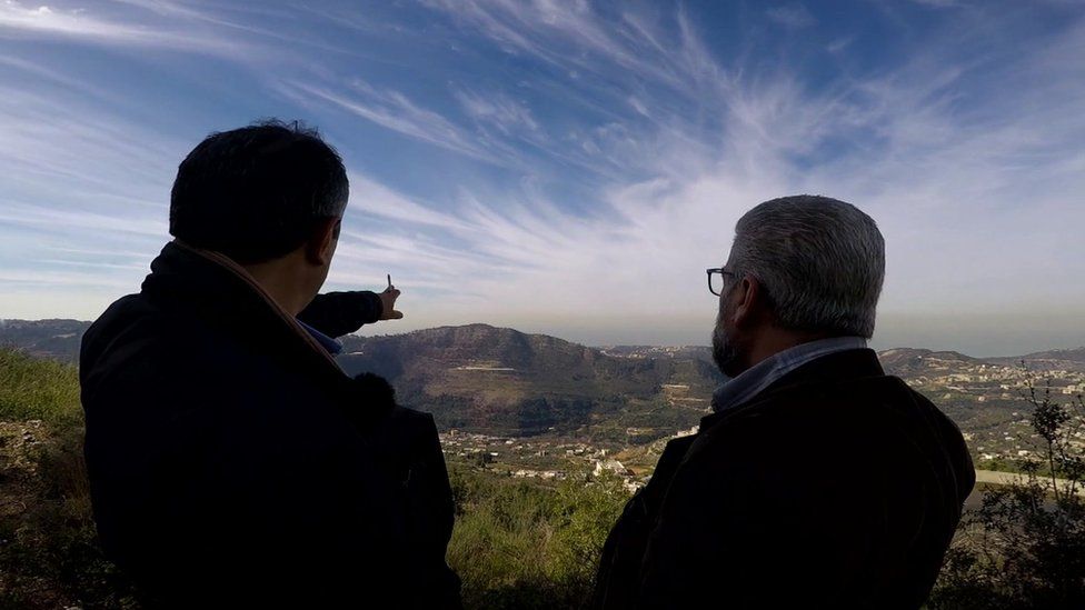 Antoun and Badri survey the landscape at Jahliyeh