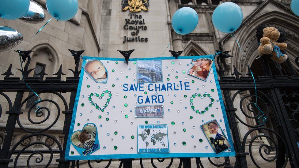 Photo tributes outside the Royal Courts of Justice