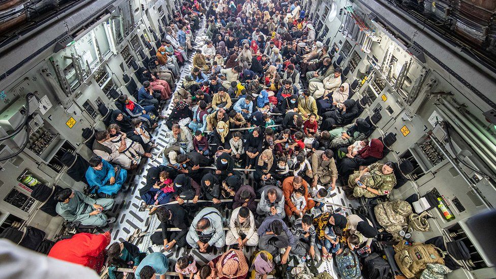 Handout photo issued by the UK Ministry of Defence (MoD) of a full flight of 265 people supported by members of the UK Armed Forces on board an evacuation flight out of Kabul airport, Afghanistan.