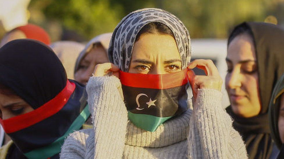 Demonstrators take part in a rally against eastern Libyan strongman Khalifa Haftar