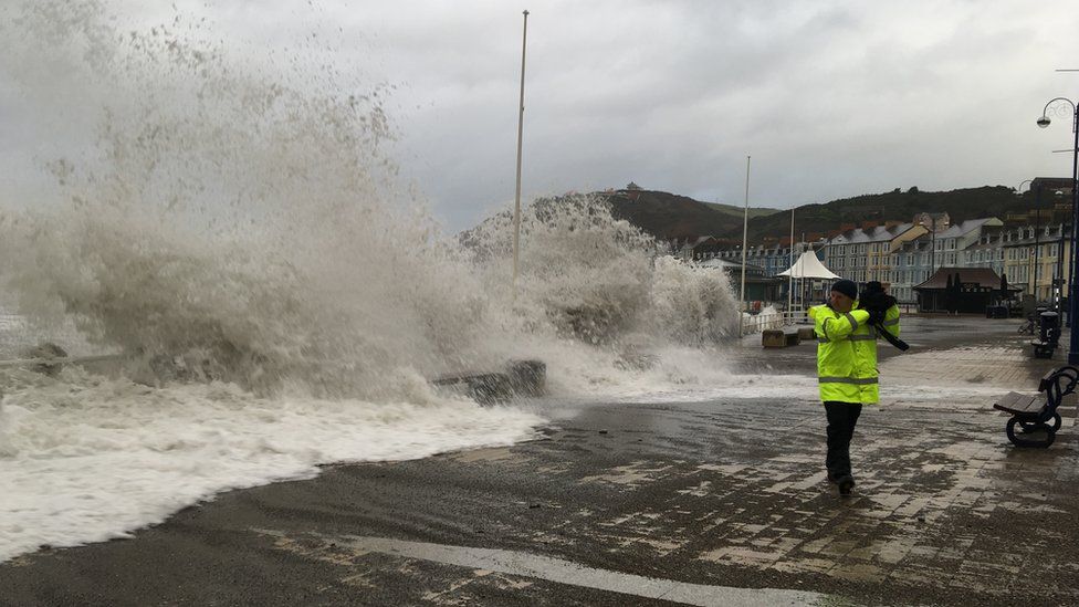 Waves crashing over Aberystwyth promenade