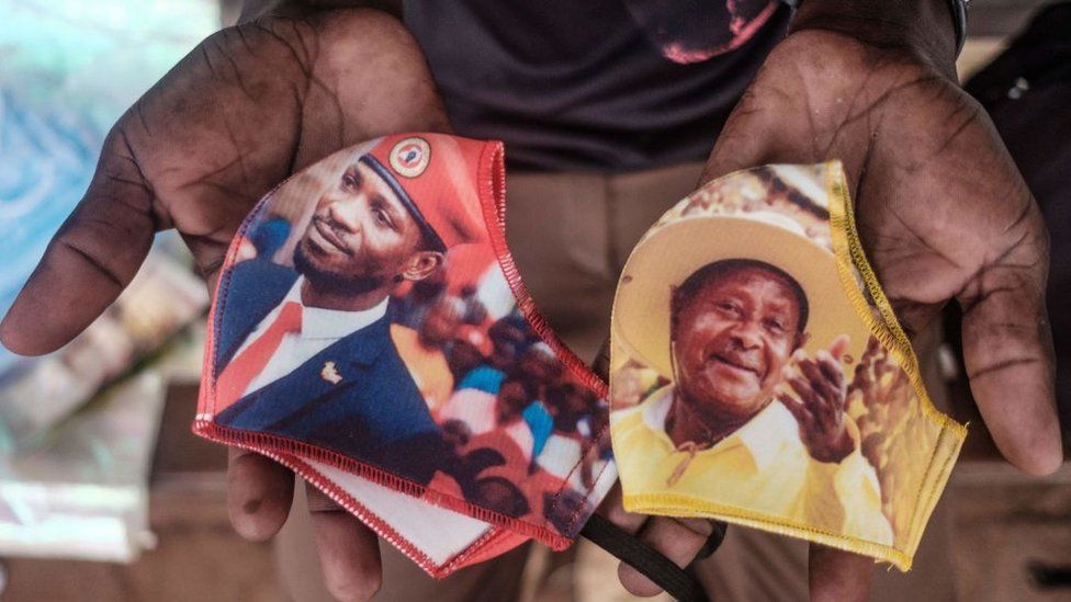 Face masks showing presidential candidates in Uganda - Bobi Wine, left, and Yoweri Museveni, right