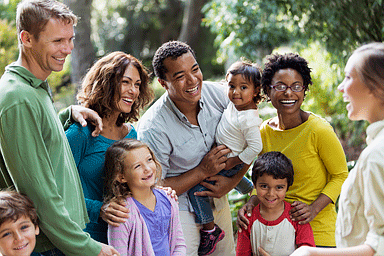 Multi-ethnic families at a park