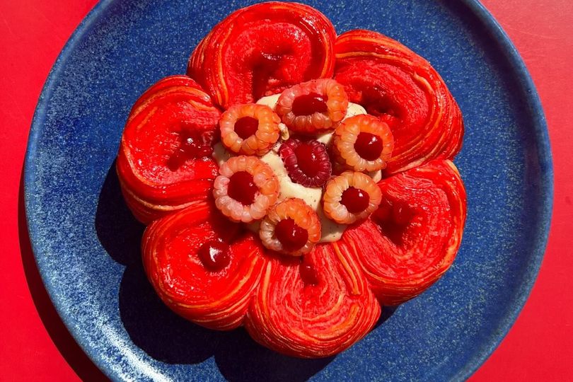 Pull off the petals of this edible, raspberry coulis-filled blossom.