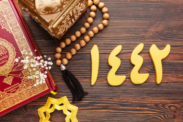 Islamic new year decoration with quran and praying beads