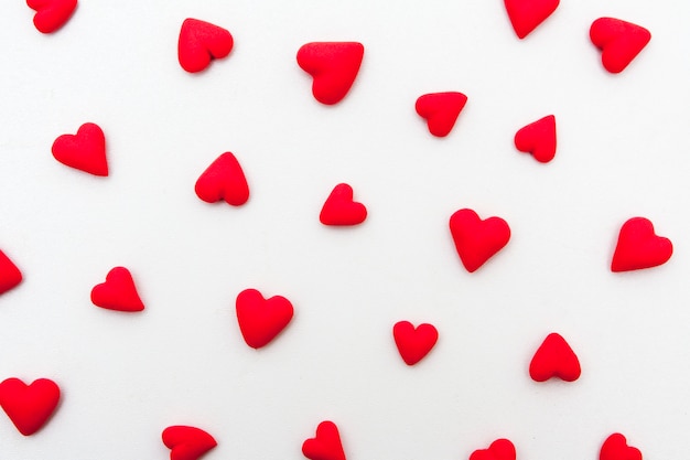 Red hearts on a white background. Valentine's Day Pattern