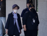 Yoon's mother-in-law set free on parole 2 months before end of term