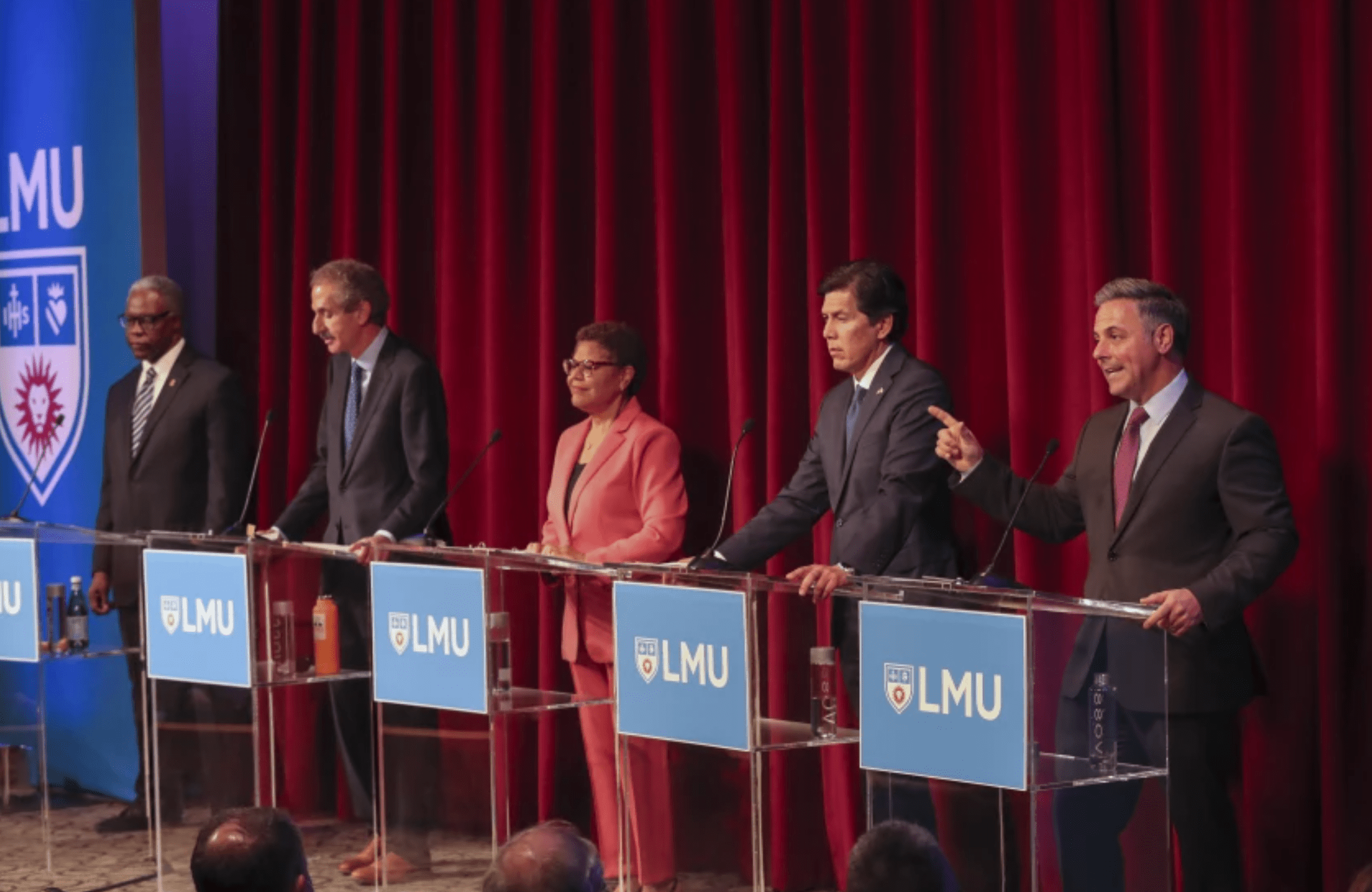 Los Angeles mayoral candidates, from left, former Metro board member Mel Wilson, L.A. City Atty. Mike Feuer, Rep. Karen Bass and L.A. City Councilmembers Kevin de León and Joe Buscaino participate in last month’s debate at Loyola Marymount University.(Allen J. Schaben / Los Angeles Times)