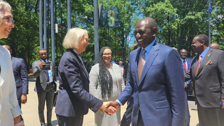 President William Ruto greets US Ambassador to Kenya Meg Whitman when he arrived at the Carter Presidential Library and Museum in Atlanta, Georgia on May 20, 2024.