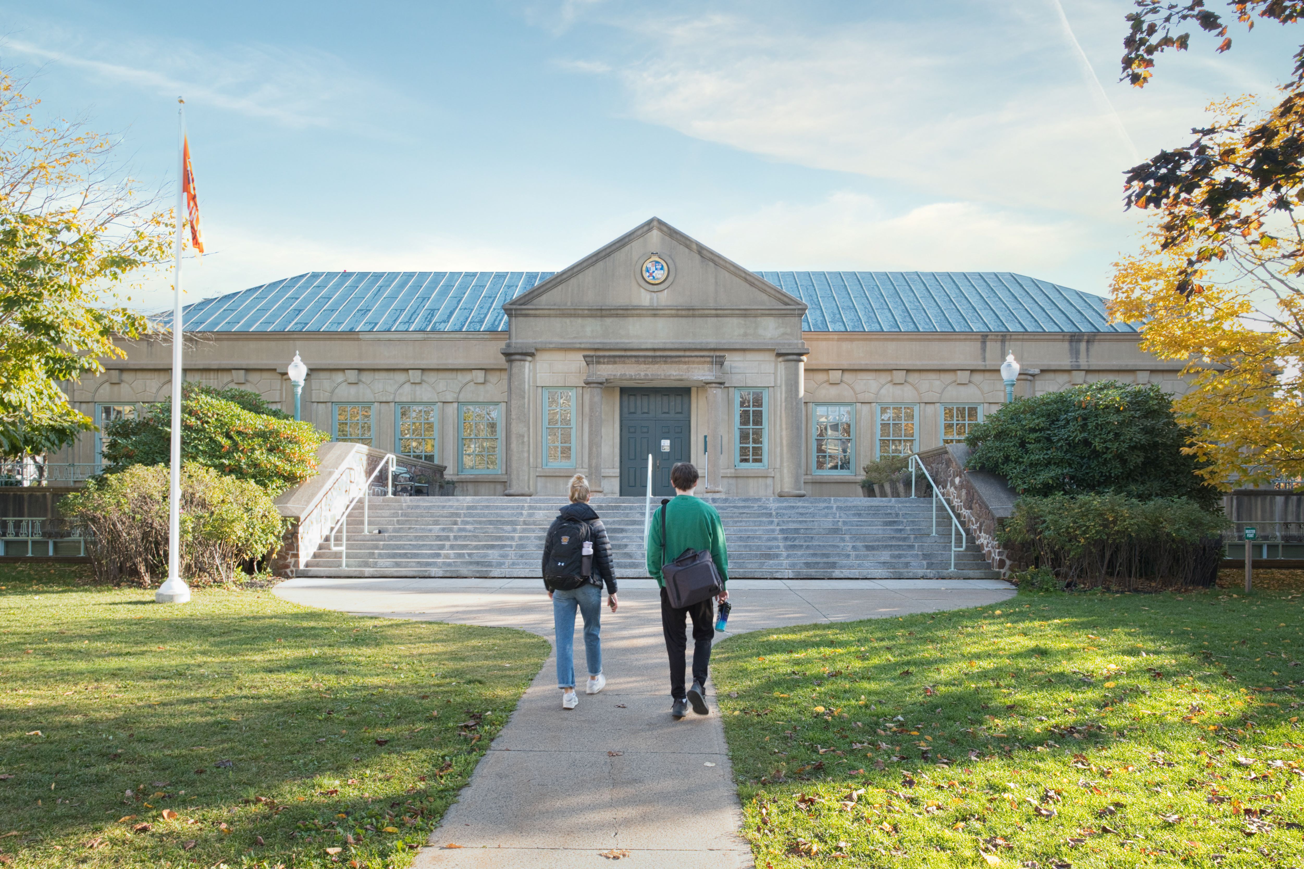 Photo of the front of King's Library with two students walking to the entrance taken by Thomas Guignard in October 2023