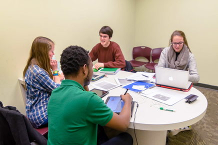 Students working in an Undergraduate Library study room