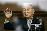 Japan's Emperor Akihito waves to well-wishers.