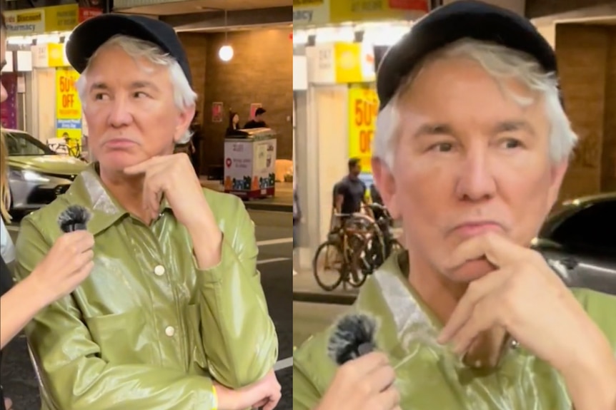 A triptych of the director Baz Luhrmann, black hat, green jacket, grey hair, with a little microphone in his face