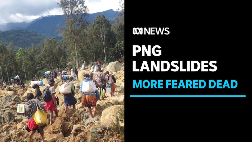 PNG Landslides, More Feared Dead: People with their backs to camera, carrying bags climb over rubble. 