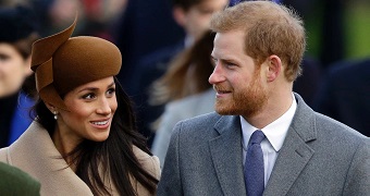 Meghan Markle gazes lovingly at Prince Harry.