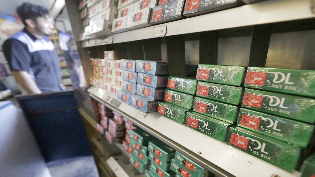 This May 17, 2018 file photo shows packs of menthol cigarettes and other tobacco products at a store in San Francisco. On Thursday, April 29, 2021, the Food and Drug Administration pledged again to try to ban menthol cigarettes, this time under pressure from African American groups to remove the mint flavor popular among Black smokers. (AP Photo/Jeff Chiu, File)