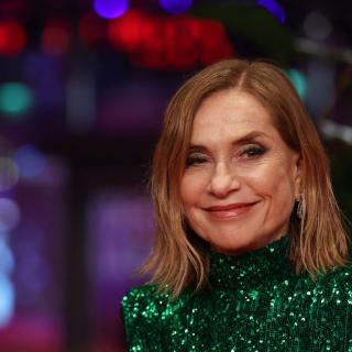 French actress Isabelle Huppert poses on the red carpet for the film Yeohaengjaui pilyo (A Travelers Needs) presented in competition at the 74th Berlinale, on February 19, 2024 in Berlin. (Photo by Ronny HARTMANN / AFP)