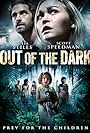 Scott Speedman and Julia Stiles in Out of the Dark (2014)