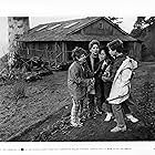 Sean Astin, Corey Feldman, Jeff Cohen, and Ke Huy Quan in The Goonies (1985)