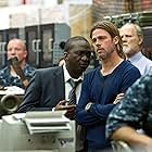 Brad Pitt and Fana Mokoena in World War Z (2013)
