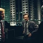 Gary Oldman, Christian Bale, and Aaron Eckhart in The Dark Knight (2008)