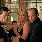 Charlize Theron, Mark Wahlberg, and Jason Statham in The Italian Job (2003)