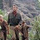 Sam Neill, Ariana Richards, and Joseph Mazzello in Jurassic Park (1993)