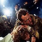 Bruce Willis, Bonnie Bedelia, and Reginald VelJohnson in Die Hard (1988)