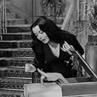 Carolyn Jones and Thing in The Addams Family (1964)