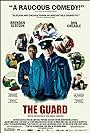 Don Cheadle and Brendan Gleeson in The Guard (2011)