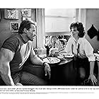 Arnold Schwarzenegger and Mercedes Ruehl in Last Action Hero (1993)