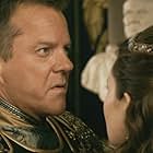 Kiefer Sutherland and Emily Browning in Pompeii (2014)