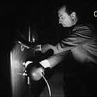 Lionel Murton in Interpol Calling (1959)