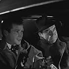 Richard Basehart and Broderick Crawford in The Swindle (1955)
