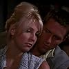 Heather Locklear and Rob Estes in Melrose Place (1992)