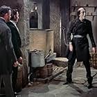 Christopher Lee, Peter Cushing, and Robert Urquhart in The Curse of Frankenstein (1957)